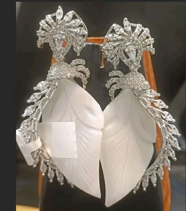 Mother Of Pearl Add Diamond Esque Earings