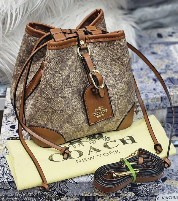 Coach Signature Canvas Bucket Bag – Casual Elegance Redefined