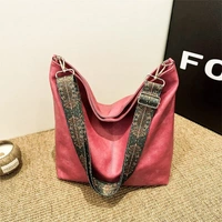 Black Leather-Look Sling Bag with Broad Patterned Strap and Coin Purse