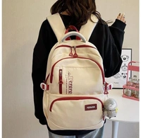 Black Backpack with Plush Charm