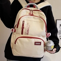 Black Backpack with Plush Charm