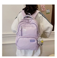 Black Backpack with Plush Charm