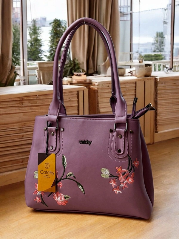 Catchy Maroon Handbag with Floral Embroidery