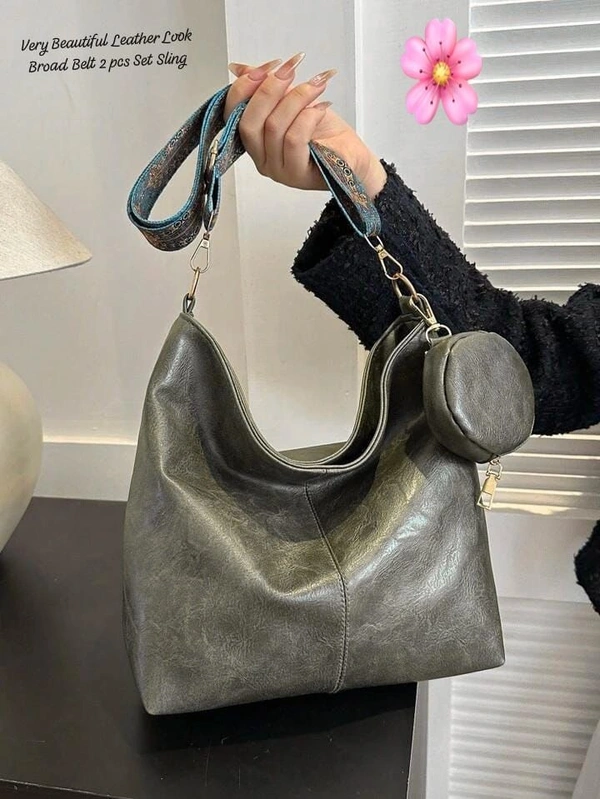 Black Leather-Look Sling Bag with Broad Patterned Strap and Coin Purse