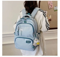 Black Backpack with Plush Charm