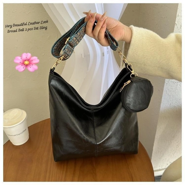 Black Leather-Look Sling Bag with Broad Patterned Strap and Coin Purse