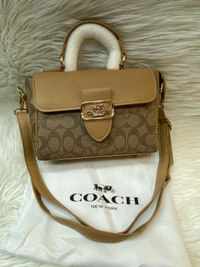  Coach Women's Signature Canvas Riley Top Handle Bags