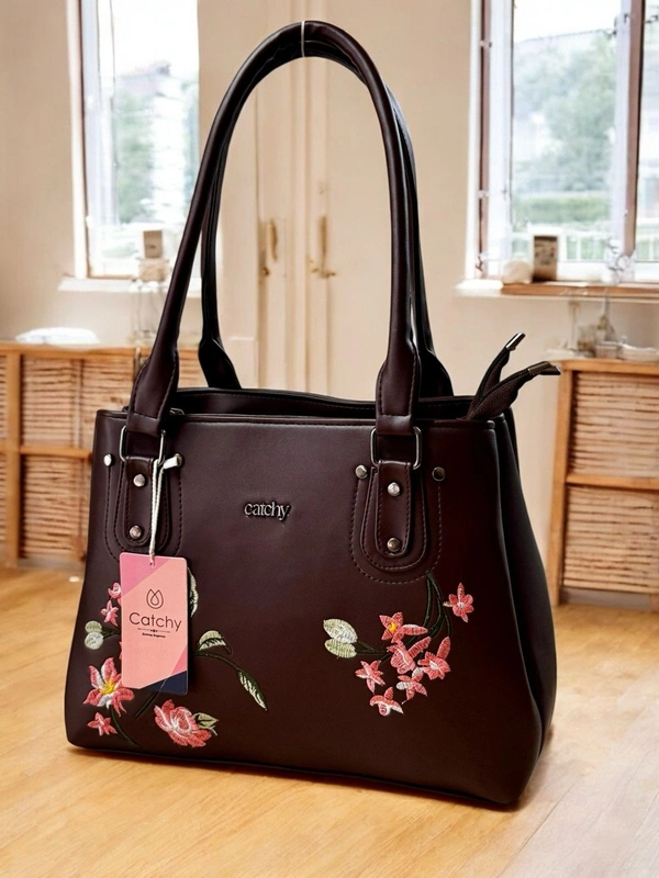 Catchy Maroon Handbag with Floral Embroidery