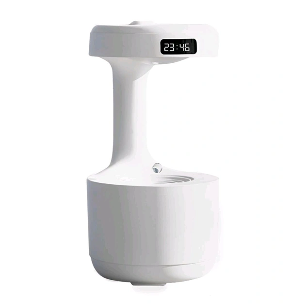 Anti-Gravity Water Flow with Smart LED Clock Display: The anti-gravity water flow technology creates the illusion of backflow droplets and a soothing running water noise with a smart LED Clock display to track time and a warm light.

Air humidifier: Water drop reflux atomization technology - White, 1