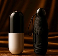 Mini Capsule Umbrella For This Season Easy To Carry And And Usable In Rain & Summer