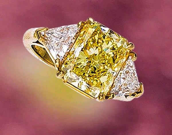 Yellow Diamond 3cts Radiant Cut and on both side Trilliant Cut LGD Diamond