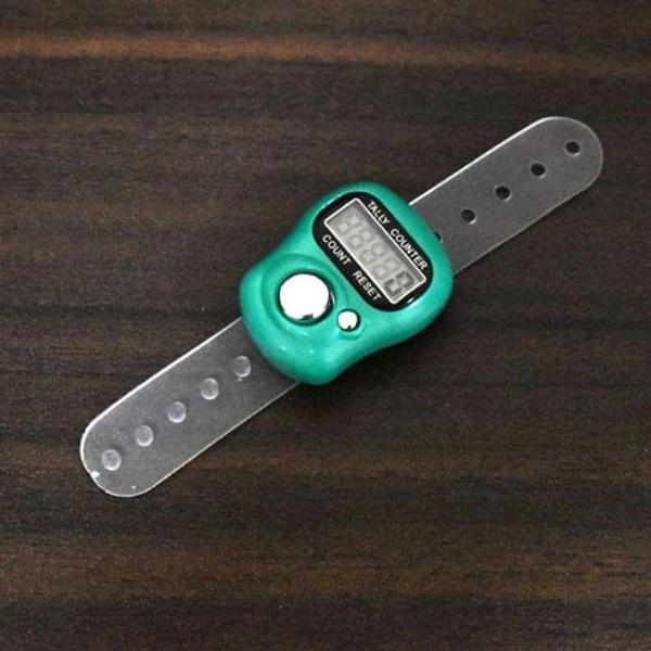 Digital Finger Tally Counter with LCD display, adjustable finger strap, and quick mechanical press reaction. Easy one-hand use, reset button to clear count, and auto power-saving function. Ideal for prayer, sports, inventory, and public place counting. Made of plastic. Color as per availability. Compact and lightweight design.

 - Teal, Handy