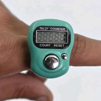 Digital Finger Tally Counter with LCD display, adjustable finger strap, and quick mechanical press reaction. Easy one-hand use, reset button to clear count, and auto power-saving function. Ideal for prayer, sports, inventory, and public place counting. Made of plastic. Color as per availability. Compact and lightweight design.

 - Teal, Handy