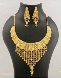 SK JEWELLERS Antique Gold Plated Temple Necklace Set With Earrings For Women. 