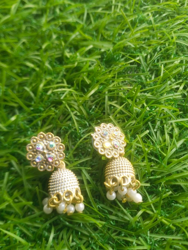 DEW MAT Small And Simpal Pack 1 Pair Cubic
Zirconia, Diamond Alloy Jhumki Earring
FAssured