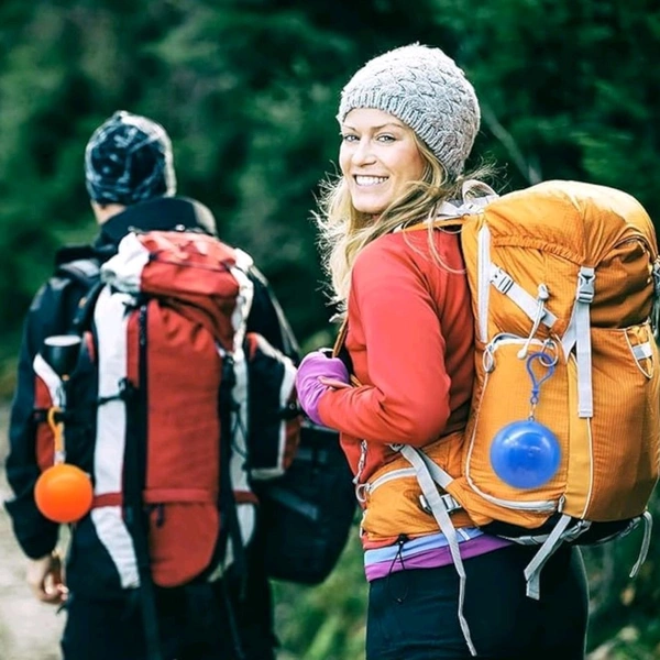Portable Capsule Raincoat with Keychain – Compact Travel Gear

