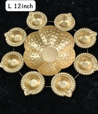 Metal urli size 12 inches All real pics shared  Now you can buy soya wax filled on the sides at 100 rs extra in any design Material iron with brass coated  Pic shared for reference