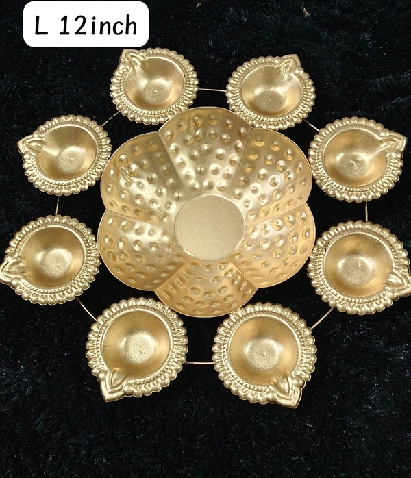 Metal urli size 12 inches All real pics shared  Now you can buy soya wax filled on the sides at 100 rs extra in any design Material iron with brass coated  Pic shared for reference