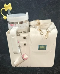 New hc premium stanley combo 1 stanley bag 1 stanley floral sipper 1 keychain 1 straw stopper Color of bag n stanley will remain same, rest two items based on availability