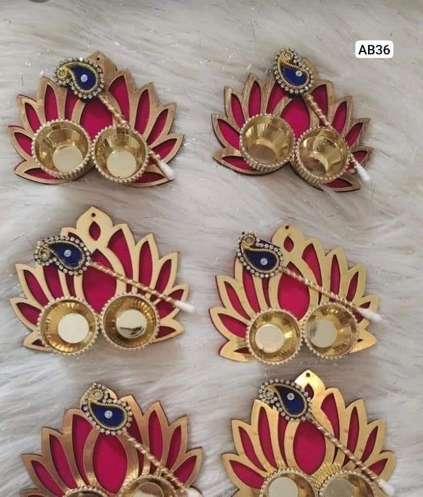 Lotus roli chawal plate with tilak stick Color random only. Single pcs