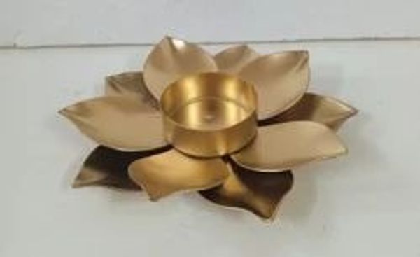 Metal tealight holder Available in plain and jali design Size 6-7 inches