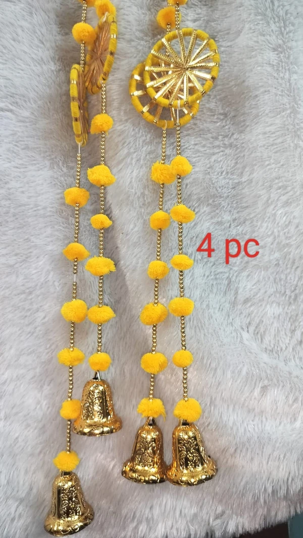 Yellow chakri pompom bell hangings  each 4 pc available 5 feet each