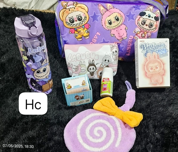 New labubu combo Labubu duffle bag (13*7 inches) 1 big into energy labubu doll 1 plastic labubu sipper bottle 1 labubu pouch 1 labubu tape roll 1 soap rollee 1 hand towel. Pls note combo will be same but color random throughout.