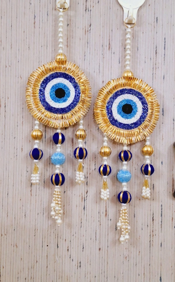 Beautiful evil eye pair available in pink and yellow color available Blue not available