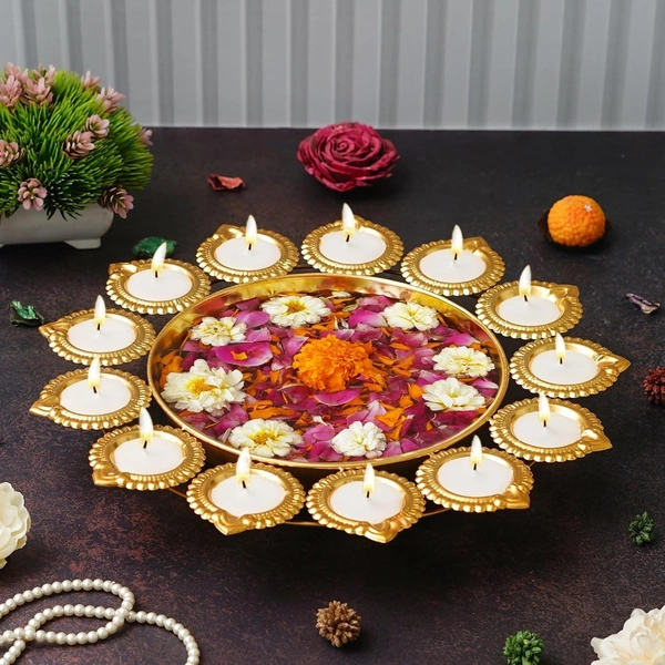 Metal urli size 12 inches All real pics shared  Now you can buy soya wax filled on the sides at 100 rs extra in any design Material iron with brass coated  Pic shared for reference