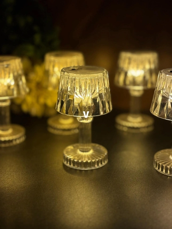 Shadow lamps in warm white Buy box of 12 pcs