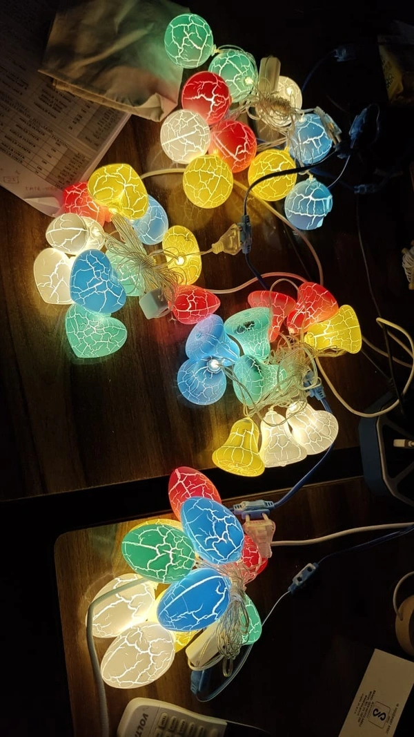 Cracked pattern string lights in 4 different patterns 10 pc in each string(example 10balls/stars).Length 2 mtrs - Bell