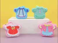 New metal piggy bank in hut and dress shape