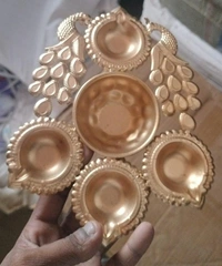 Combo of 1 potli both side printed plus 1 metal urli 7 inch.Potli color random only