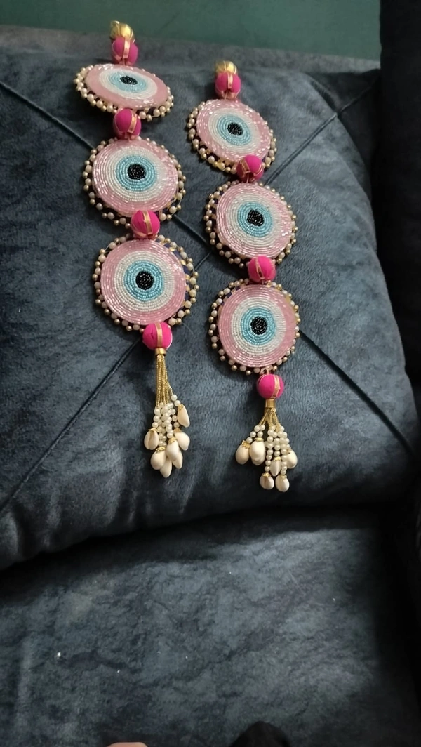 Evil eye hangingPair  Pink, yellow n blue color available  Latkan will be different