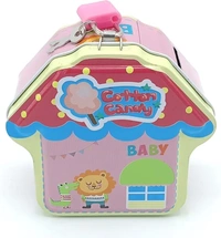 New metal piggy bank in hut and dress shape