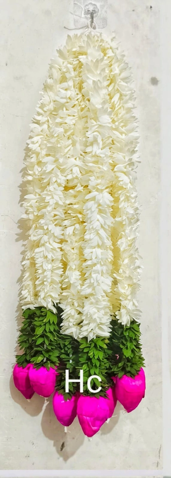 Gajra lotus bud hanging Set of 10 strings 3 feet each.Comes in bag packing 