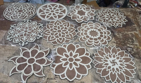 Mdf stencil rangoli 12 inch. Real pic shared of all available designs Random will be shipped In set of 10, single pcs of all designs will be there