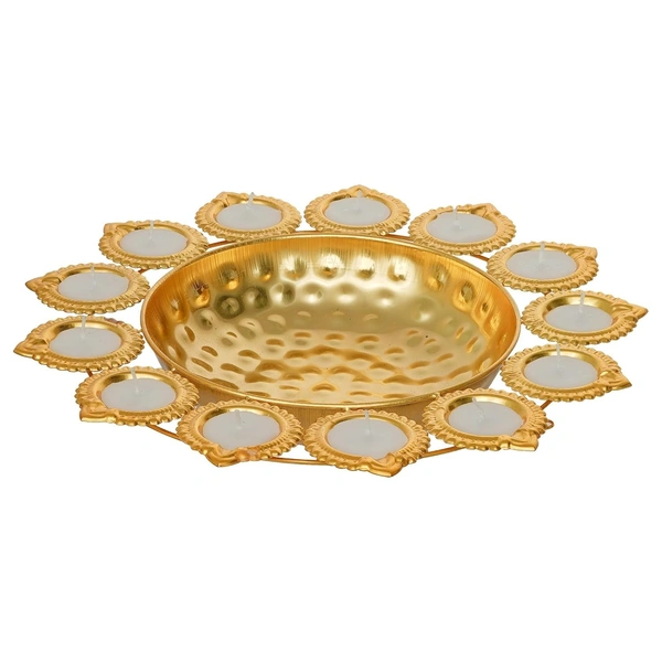 Metal urli size 12 inches All real pics shared  Now you can buy soya wax filled on the sides at 100 rs extra in any design Material iron with brass coated  Pic shared for reference