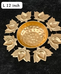 Metal urli size 12 inches All real pics shared  Now you can buy soya wax filled on the sides at 100 rs extra in any design Material iron with brass coated  Pic shared for reference