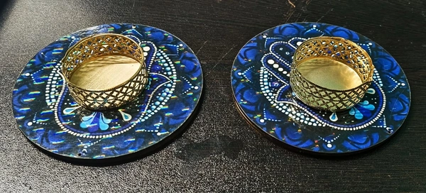 Mdf tealight holder in mandala and evil eye and butterfly.Buy any design 2 pcs. Wax tealight included Size 4 inches
