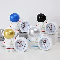 Homeoculture HomeoCulture Pack of 1 Space Theme Astronaut Robot Alarm Clock Space Twin Bell Rocket Astronaut Theme Study Table Clock Silent Bedside Alarm Clock for Kids Room Girls Boys Stationary Birthday Kanjak Return Gift(Random Colour) - 0.5