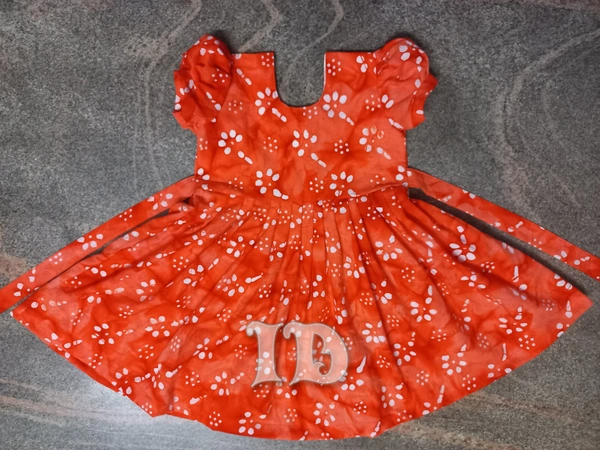 1139/orange Batik Frock - 8yr