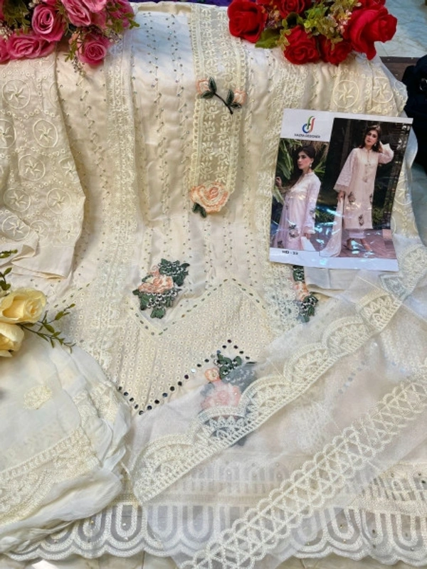 Charmlook 🎁 *HAZRA DESIGNER* Today we are launching Pakistani  Concept...		💕 *HD - 22* 💕		 	 	 	 		 	 	 👇🏻Fabric details 👇🏻👗 TOP :  COTTON  WITH HEAVY EMBROIDERY &amp; HAND DIAMOND/GLASS WORK	SLEEVES :  COTTON WITH EMBROIDERY &amp; HAND WORK💐BOTTOM- COTTON WITH EMBROIDERY PATCH🔺DUPATTA:- NAZNEEN WITH EMBRODERY WORK	 *Singles Available*	 	  - Multicolour, HD 22