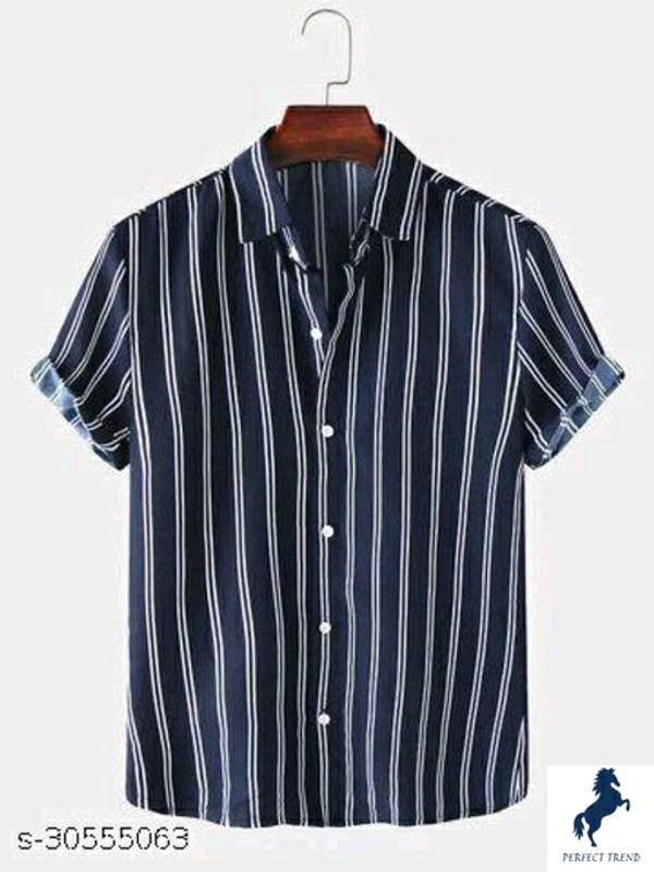 Classy Fashionable Men Shirts Fabric: RayonSleeve Length: Short SleevesPattern: PrintedMultipack: 1Sizes:S (Chest Size: 37 in, Length Size: 28in) XL (Chest Size: 43 in, Length Size: 29.5in) L (Chest Size: 41 in, Length Size: 29in) M (Chest Size: 39 in, Length Size: 28.5in) XXL (Chest Size: 45 in, Length Size: 30in) shirt,trnedy shirt,beach wear shirt,Country of Origin: India - L