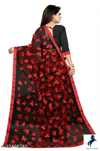 Butterfly Black&Red contrast Netsaree New Design of good quality butterflySaree Fabric: NetBlouse: Separate Blouse PieceBlouse Fabric: Satin SilkPattern: Self-DesignBlouse Pattern: EmbellishedMultipack: SingleSizes: Free Size (Saree Length Size: 5.5 m, Blouse Length Size: 0.8 m) Country of Origin: India - free size