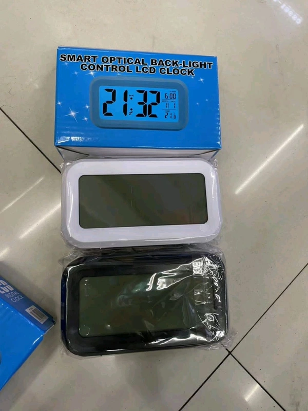CLOCK OPTICALLY CONTROL DEVICE 
