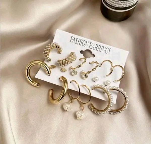 Combo Of 9 Pair Stunning Gold Plated Pearl Hoop,  Tiny and Studs Earrings for Women & Girls
Name: Combo Of 9 Pair Stunning Gold Plated Pearl Hoop,  Tiny and Studs Earrings for Women & Girls
Base Metal: Alloy
