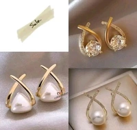 Korean style cross Pearl stud earrings cross stone study earrings for all girls and women
Name: Korean style cross Pearl stud earrings cross stone study earrings for all 