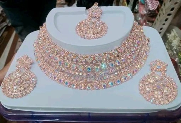 Rose gold necklace set with earrings 
Name: Rose gold necklace set with earrings 
Base Metal: Alloy
