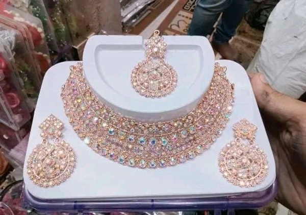 Rose gold necklace set with earrings 
Name: Rose gold necklace set with earrings 
Base Metal: Alloy
